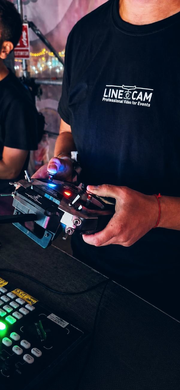 Linecam operator using the cablecam controller during a live show